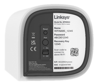 Bottom of the router showing the Pair button